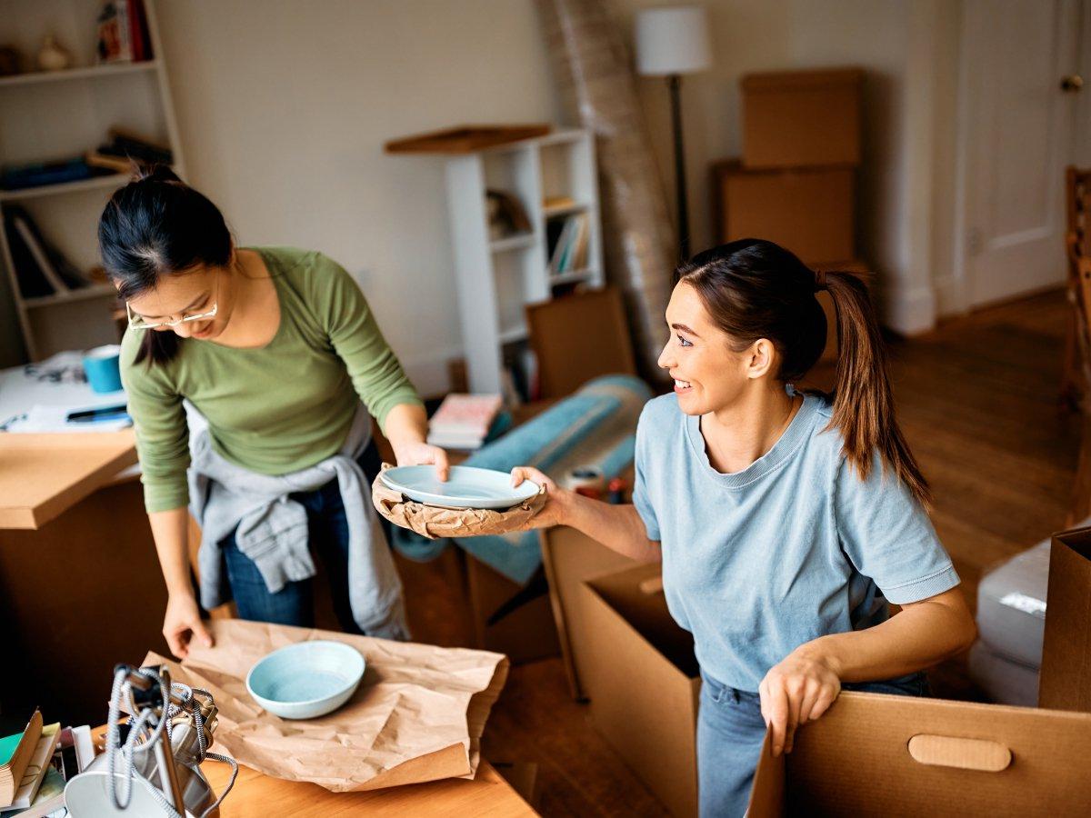 Packing dishes into boxes